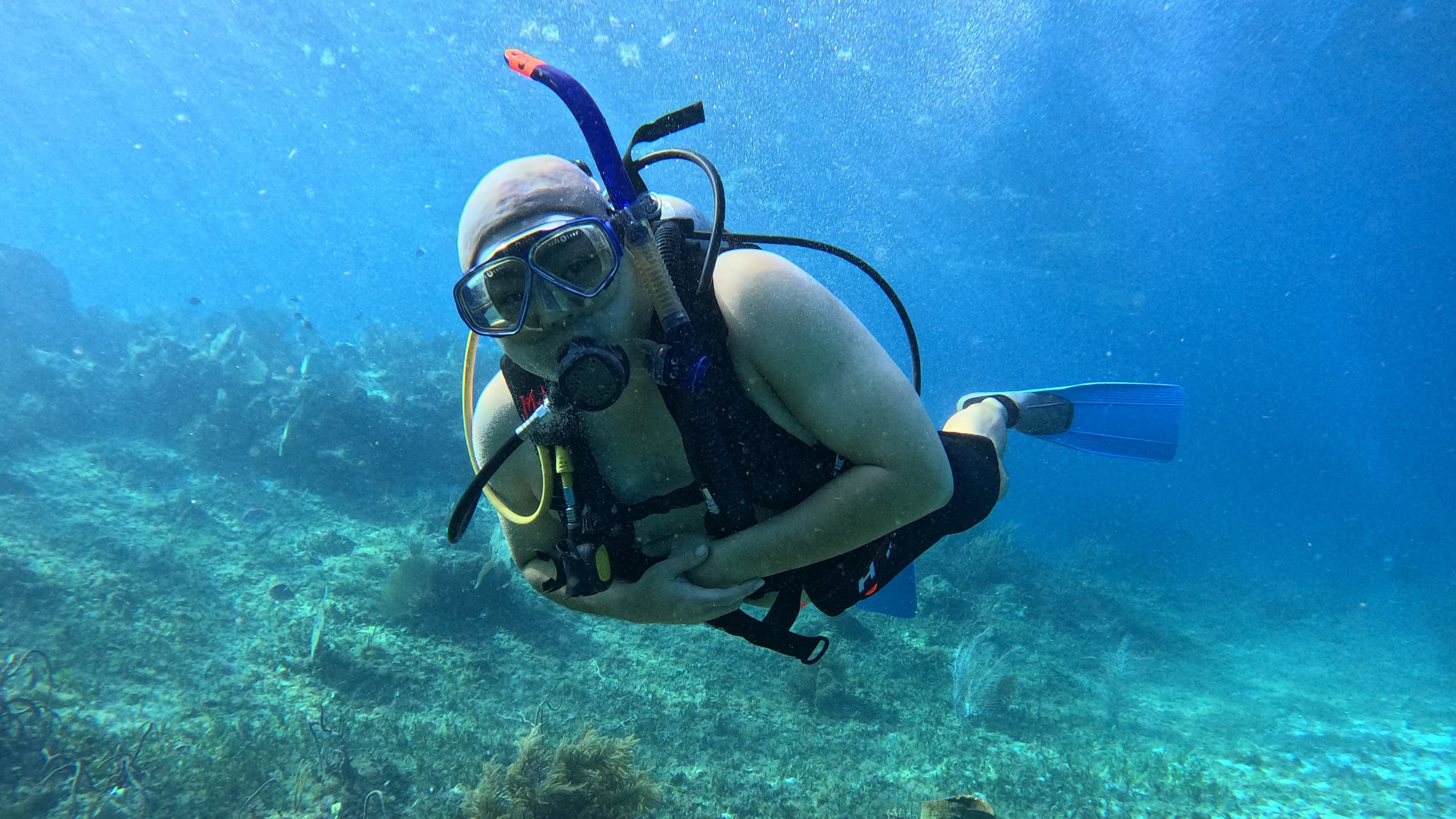 Underwater photo of a diver in clear Caribbean water.